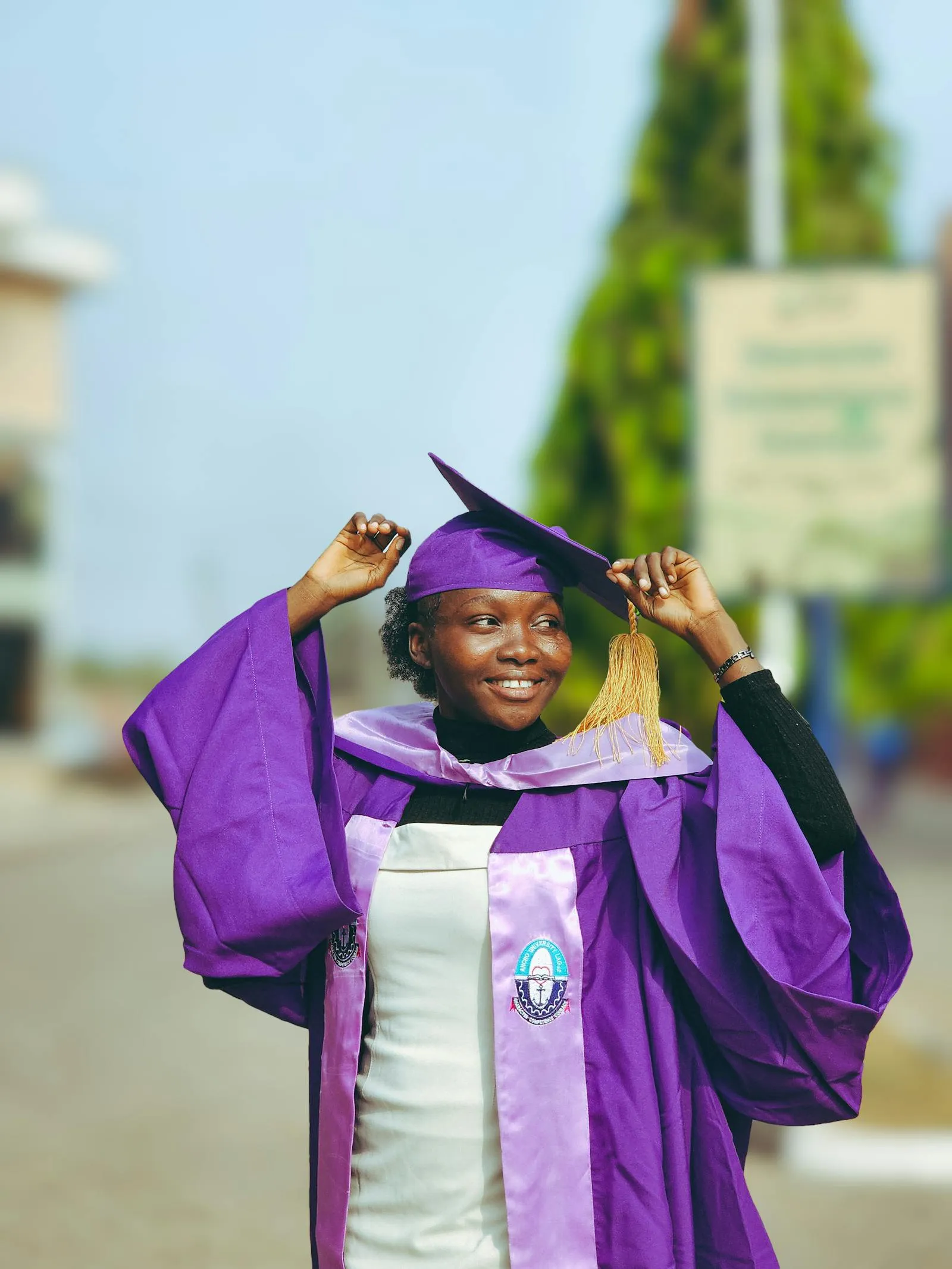 A joyful Hatzlacha College graduate celebrating success